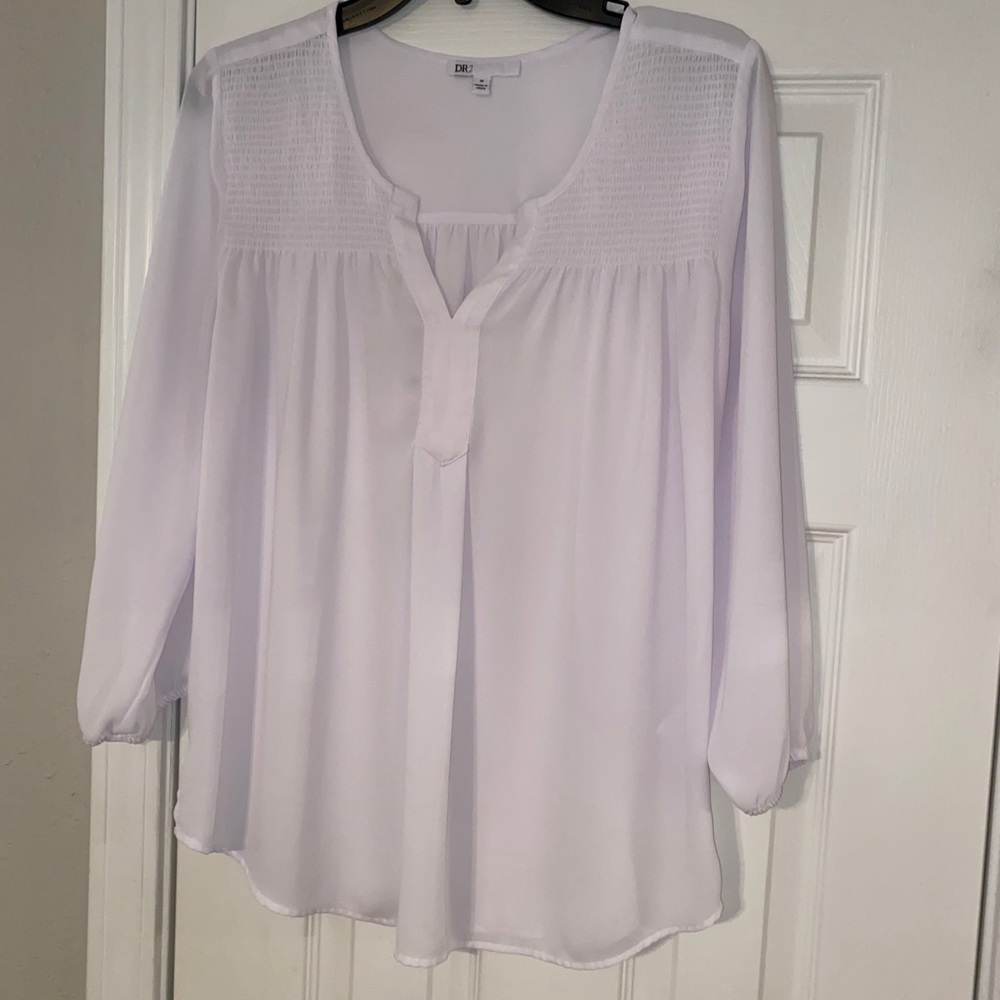 Flowy white blouse with detail